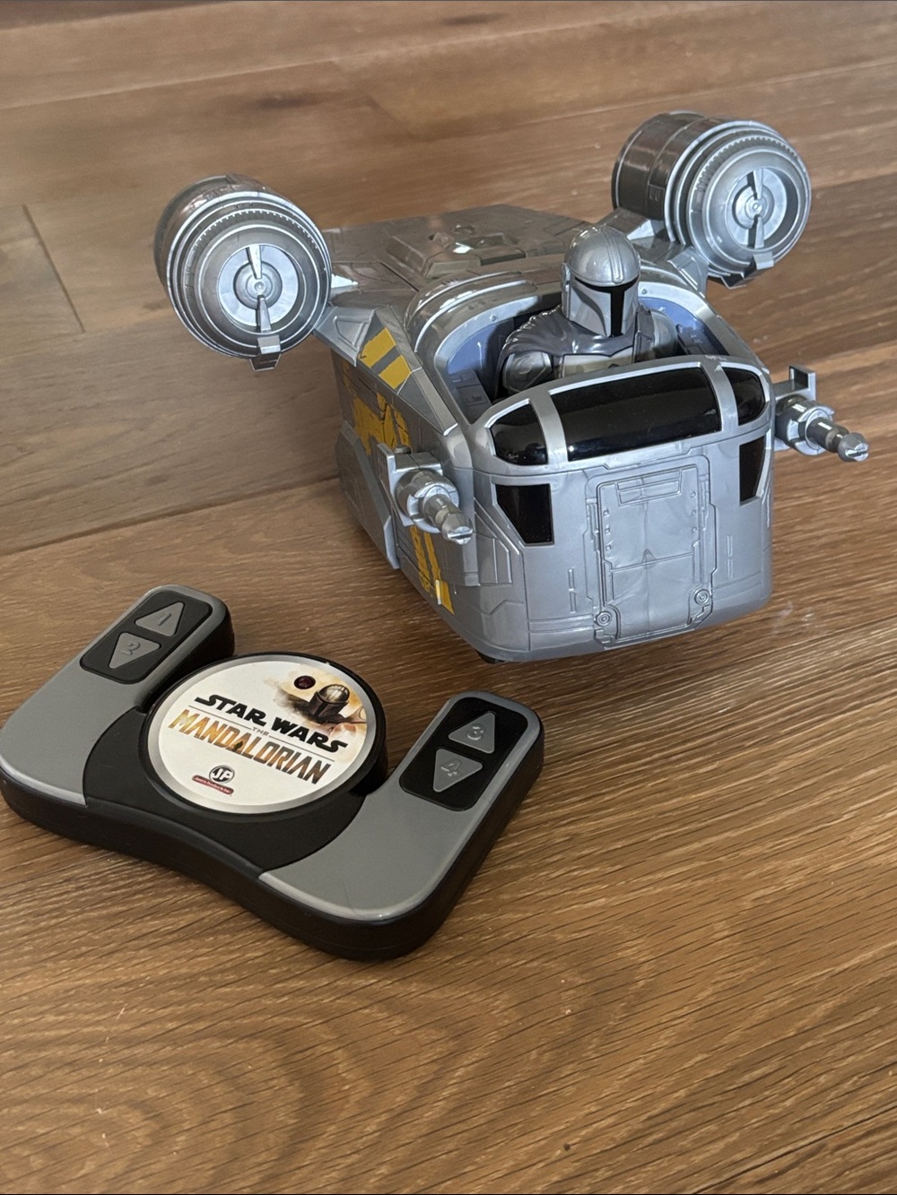 Star Wars The Mandalorian 9" Remote Control Razor Crest toy vehicle.